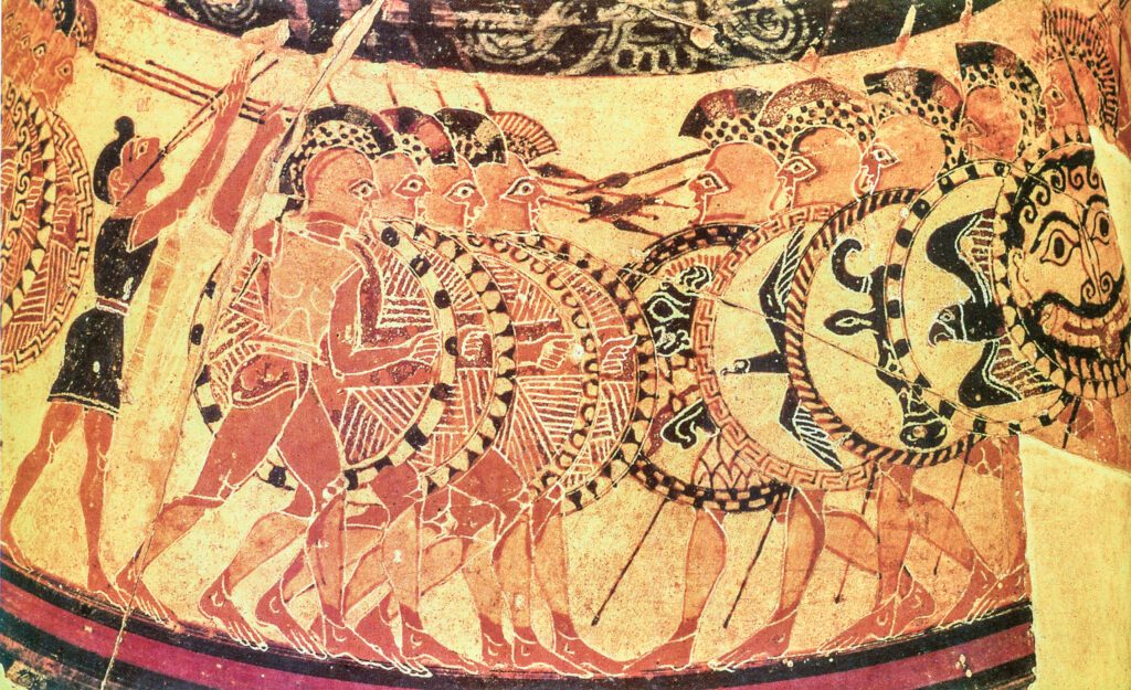 Detalle del vaso protocorintio Chigi (c. 640 a.C., Museo Nazionale Etrusco di Villa Giulia, Roma) con la primera representación conocida de una falange hoplítica griega: dos líneas de soldados con escudo redondo y lanzas avanzando al son de un flautista.